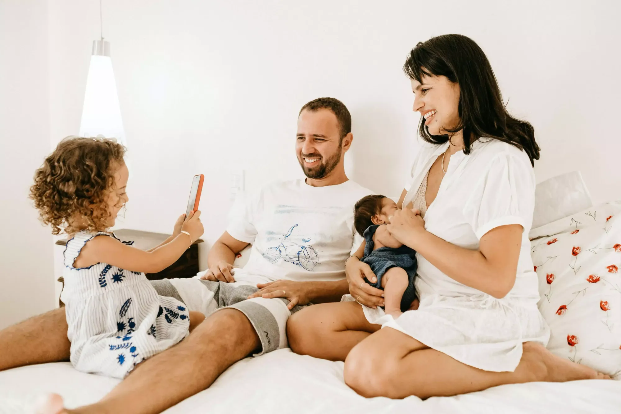 adoptive breastfeeding, holding baby, newborn infant, newborn baby