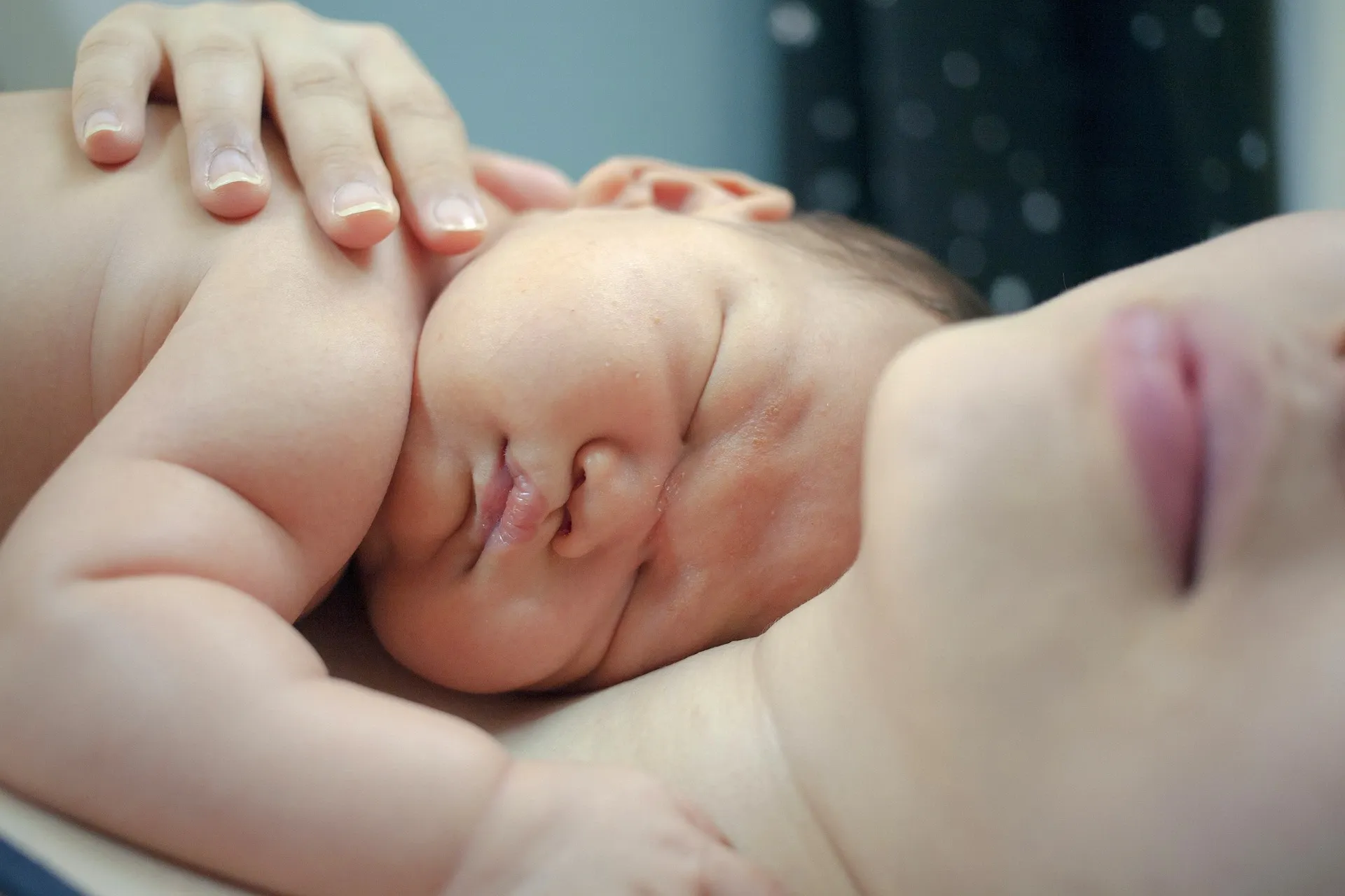 baby sleeping on mom, mother and baby