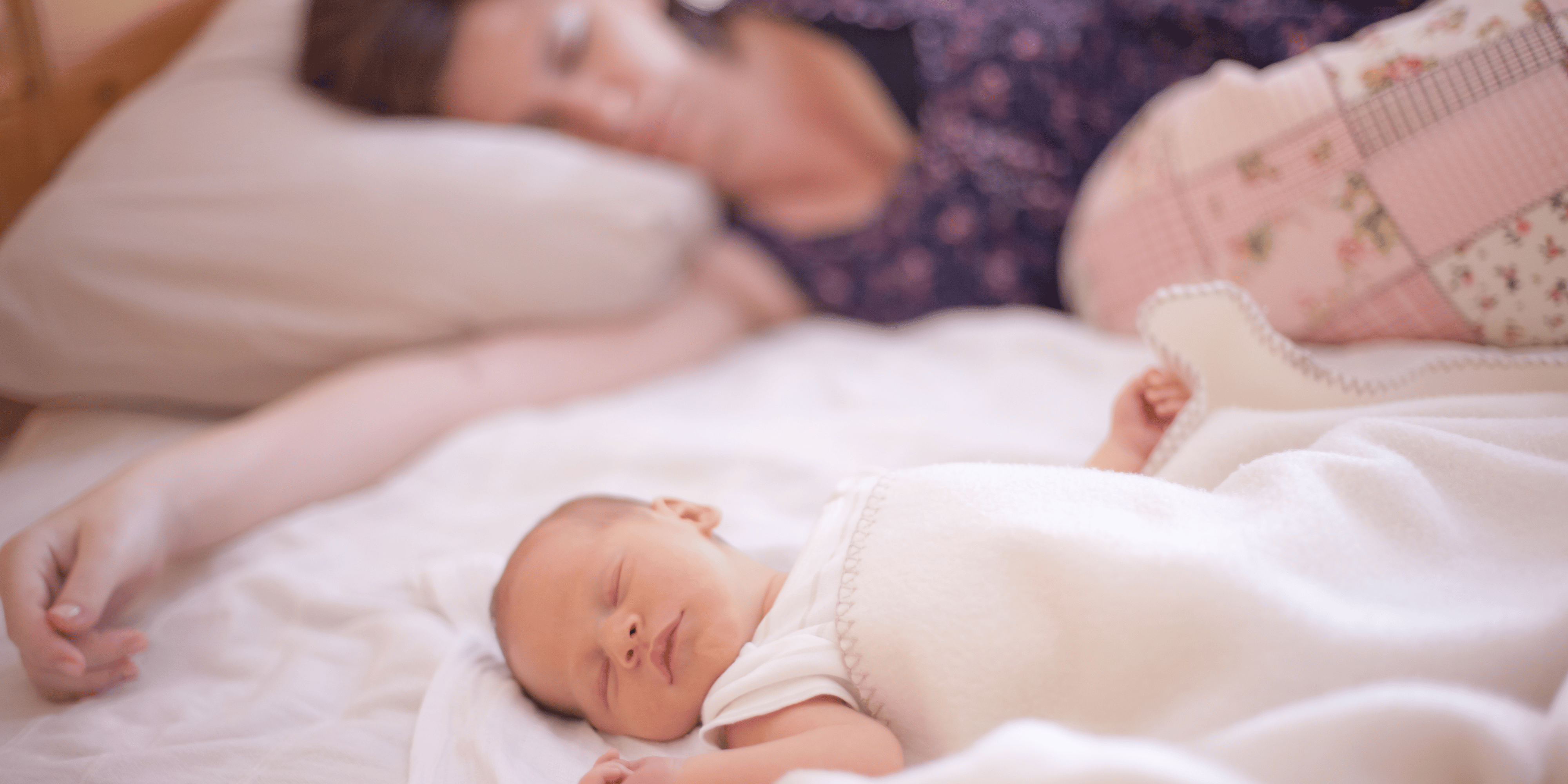 mom and baby sleeping