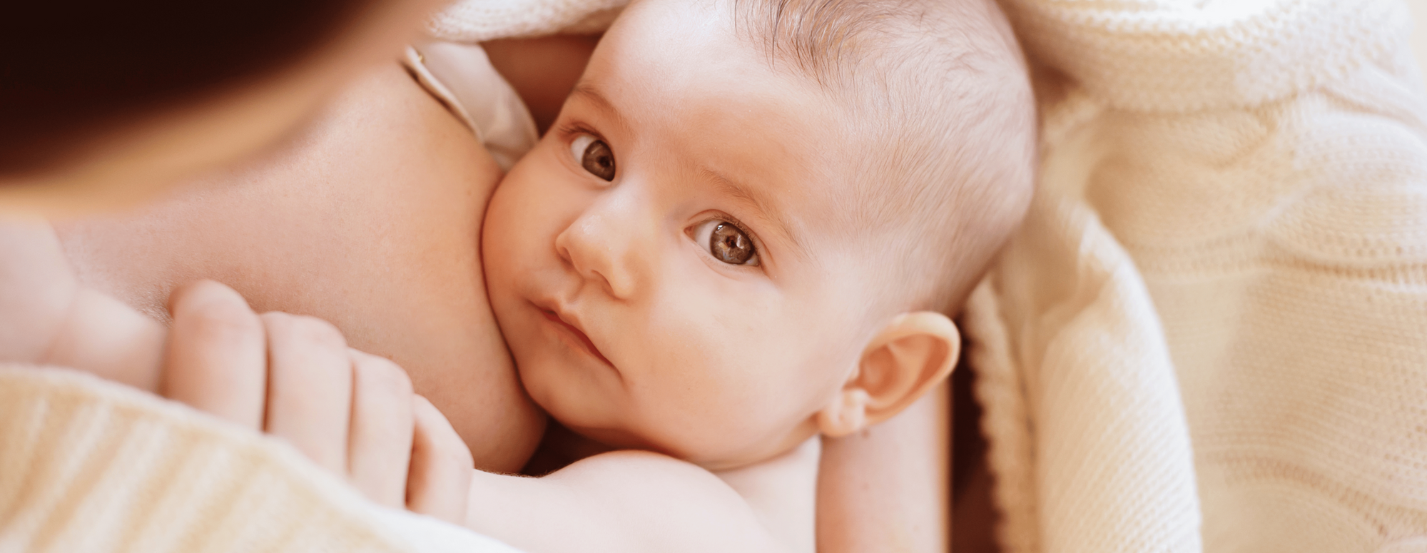 baby looking up at camera, beautiful baby