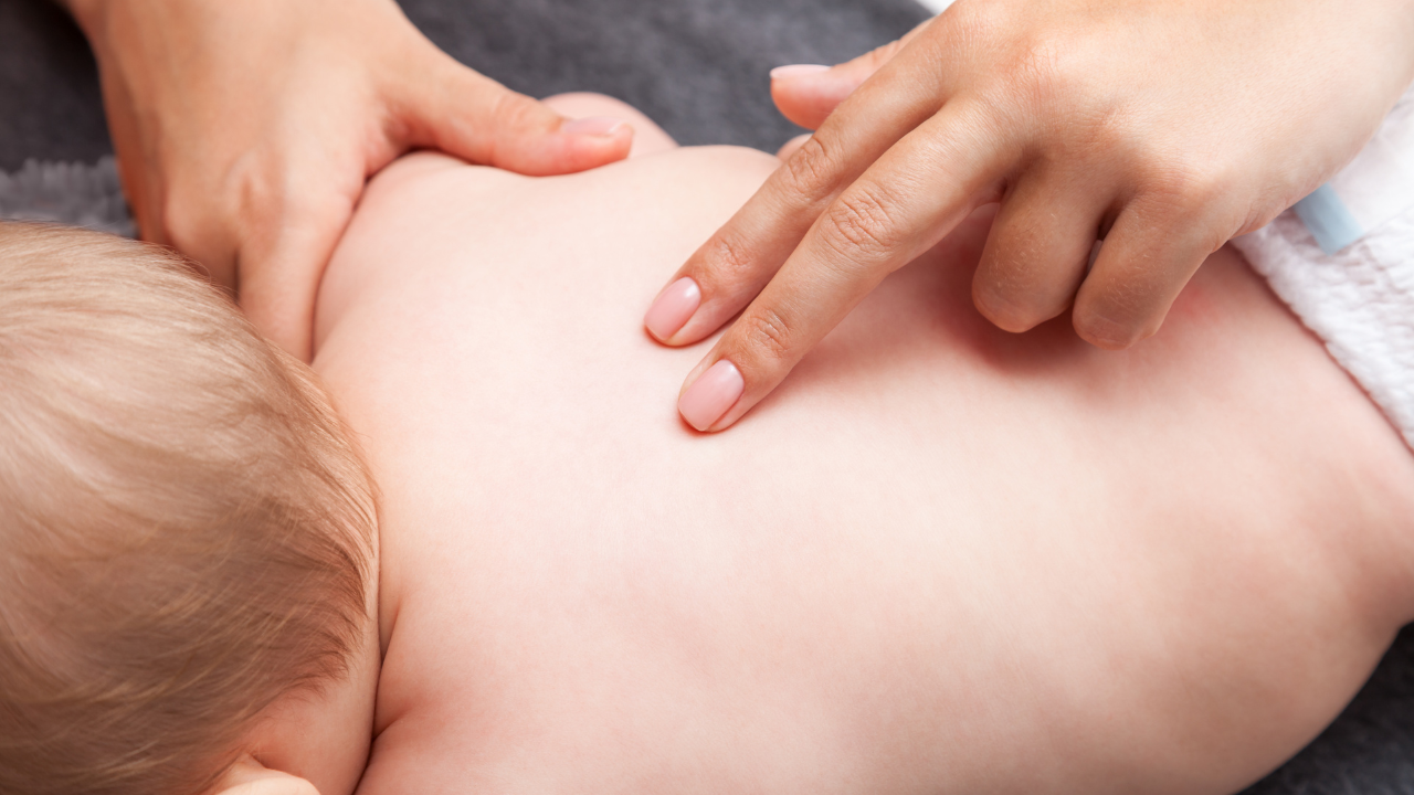 Chiropractor Helping Baby