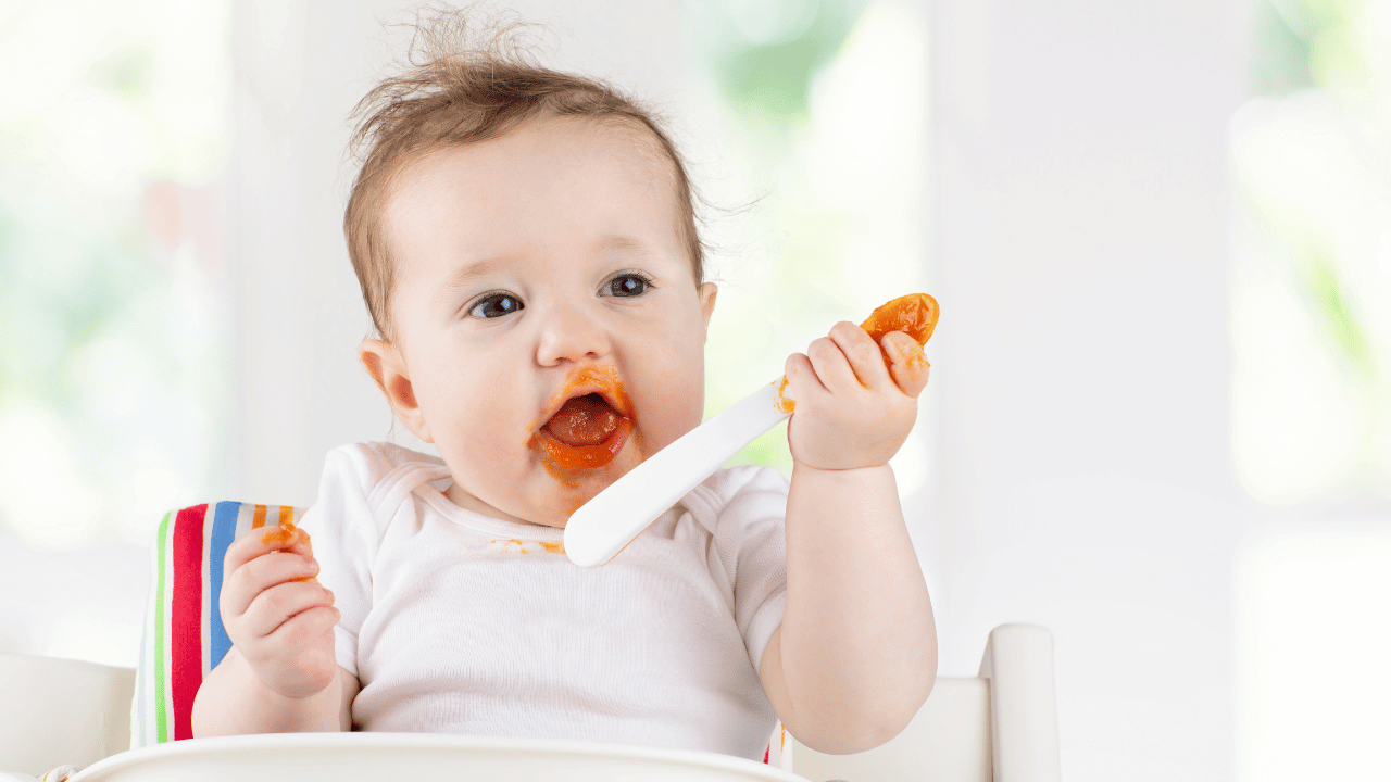 baby eating solid foods