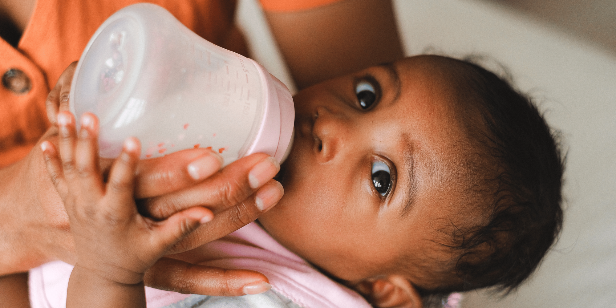 Baby drinking from a bottle