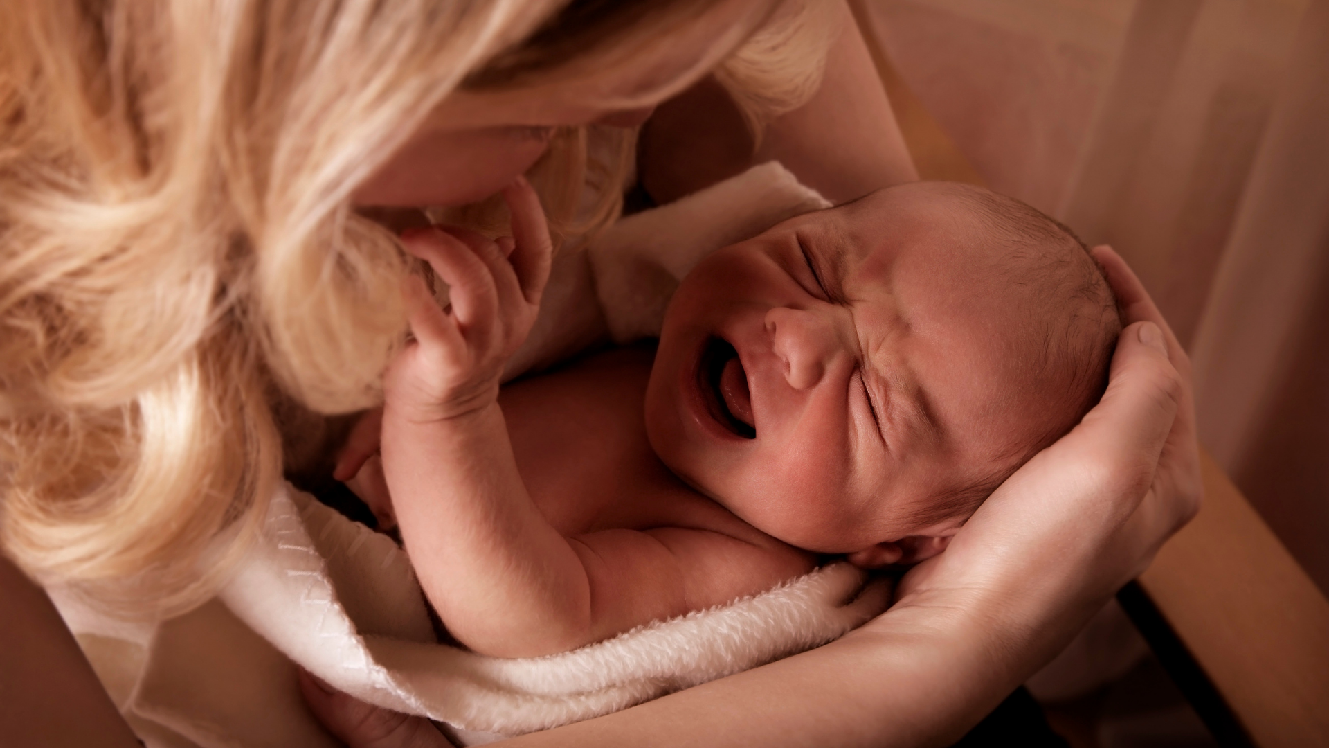 Infant Cries While Nursing