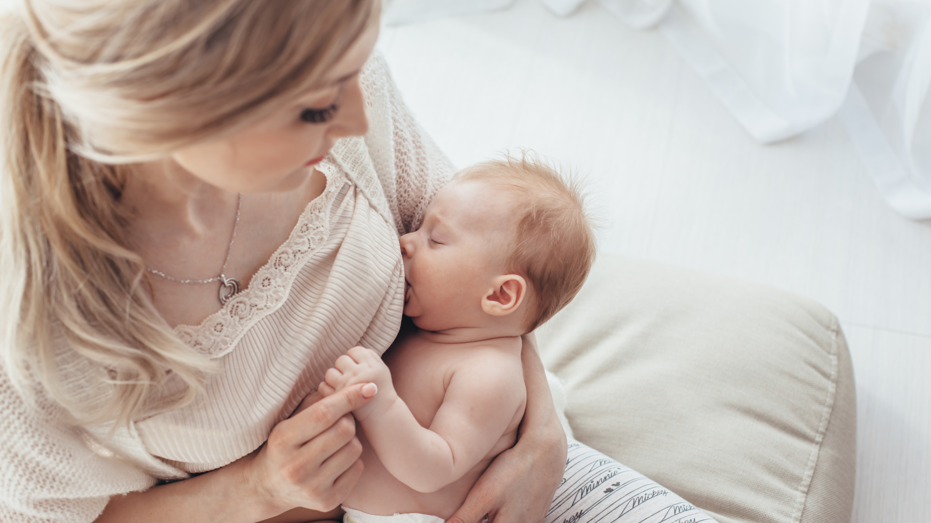 breastfeeding, nursing, blond mother nursing