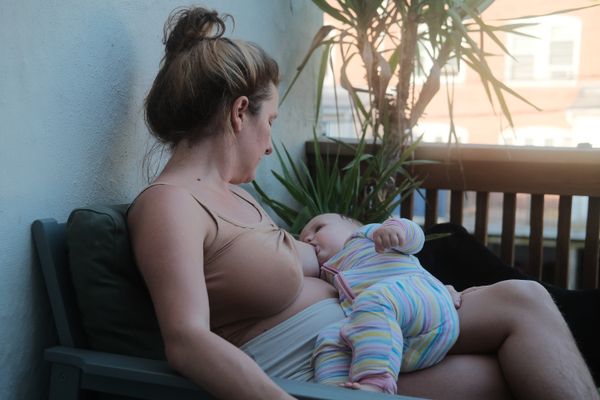 Mother breastfeeding her child