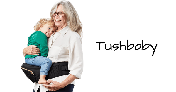 granny holding baby in a tushbaby