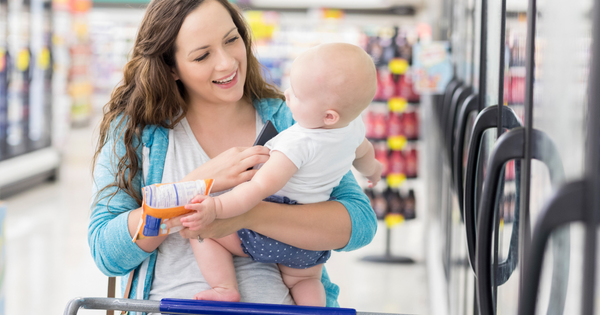 Mom on the go, mom at supermarket, mom at supermarket with baby