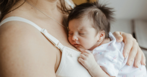 baby lying on mom's chest