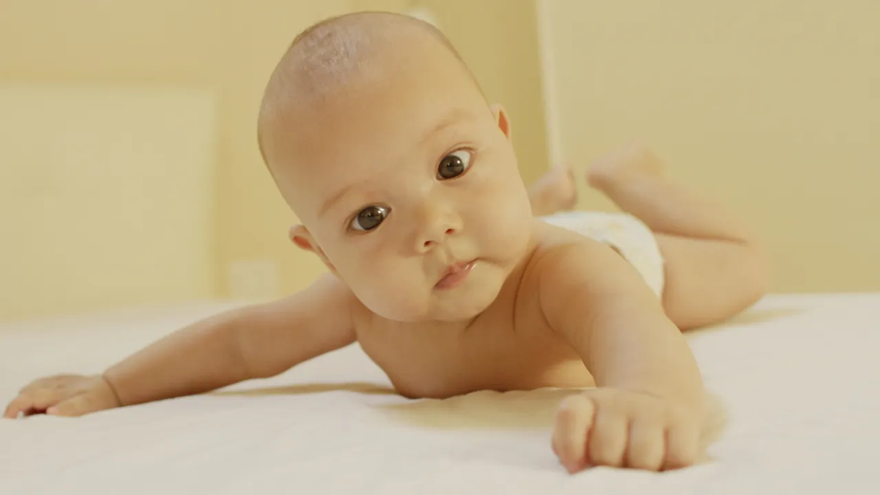 baby lying on his tummy